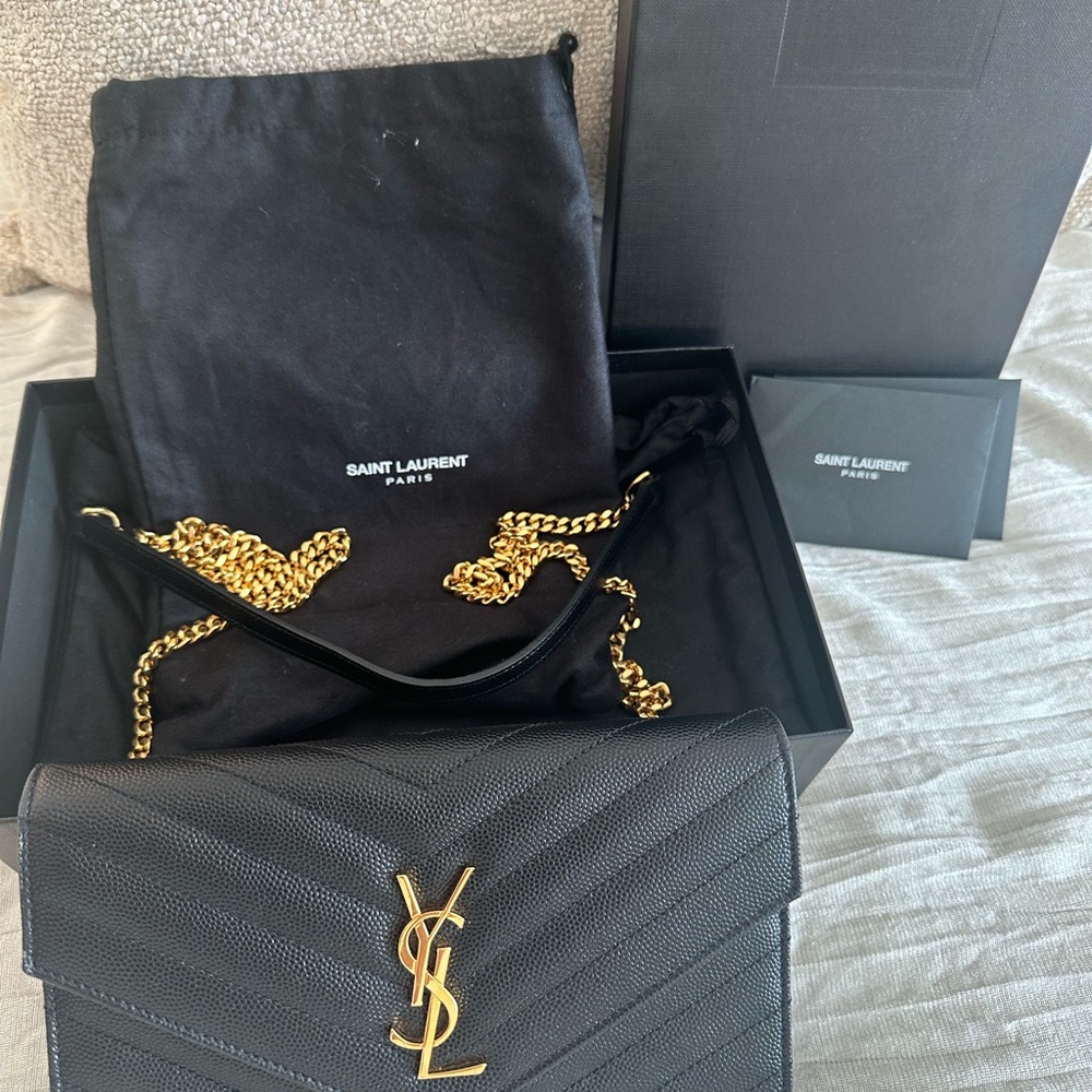 Saint Laurent Quilted Black Bag with Gold Accents